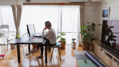 Homeworkers like this woman on her computer do not have the same level of social protection as other workers. Getty