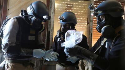 UN chemical weapons experts investigate an alleged attack in Syria. REUTERS/Mohamed Abdullah