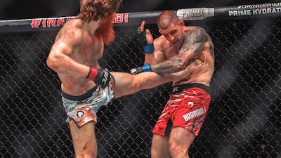 Shara Magomedov, left, lands a kick against Mark-Andre Barriault