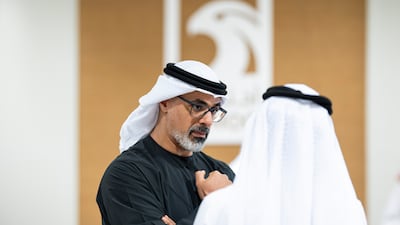 Sheikh Khaled bin Mohamed, Crown Prince of Abu Dhabi and Chairman of the Abu Dhabi Executive Council, speaks with Suhail Al Mazrouei, Minister of Energy and Infrastructure