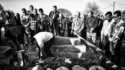 A funeral in the christian cemetery of Derik, Syria.