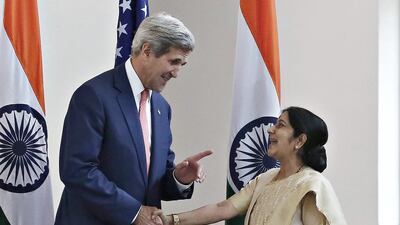 The US secretary of state John Kerry shakes hands with India’s external affairs minister, Sushma Swaraj, before the start of their meeting in New Delhi on July 31, 2014. Adnan Abidi / Reuters