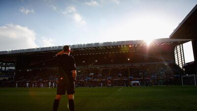 The linesman looks on during the Premier League match between Aston Villa and Swansea City at Villa Park on Saturday. Paul Thomas / Getty Images