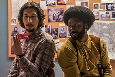 Adam Driver, left, and John David Washington in a scene from BlacKkKlansman. AP