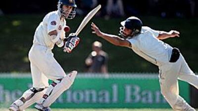 Simon Katich of Australia puts the ball past the hands of BJ Watling at Seddon Park.
