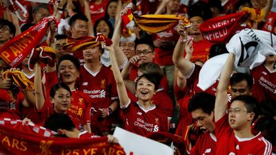 Liverpool fans show their support from the stands. Bobby Yip / Reuters