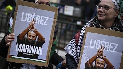 Demonstrators hold placards bearing photos of Palestinian Marwan Barghouti during a rally in Paris last month. AFP