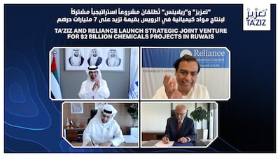 Dr Sultan Al Jaber, Minister of Industry and Advanced Technology and Adnoc managing director and group chief executive, and Reliance Industries chairman Mukesh Ambani during the signing of an agreement to form a joint venture to develop a chemicals plant in Ruwais. Adnoc