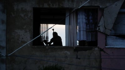 A resident of Moravska Nova Ves inspects a damaged home in the village after a tornado hit the south-eastern Czech Republic. Reuters