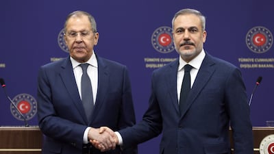 Turkish Foreign Minister Hakan Fidan, right, and Russian Foreign Minister Sergey Lavrov after their meeting in Ankara, Turkey, on Monday. EPA