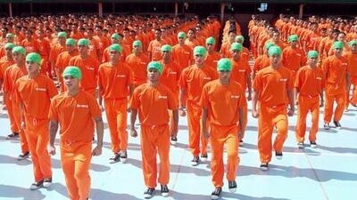 Inmates of Cebu Provincial Detention and Rehabilitation Center perform during the taping of the movie Dance of the Steel Bars. AP