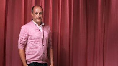 British designer Peter Copping acknowledges the public following the Nina Ricci Spring/Summer 2011 ready-to-wear collection show in Paris.