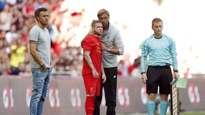 Liverpool manager Juergen Klopp gives instructions to substitute Alberto Moreno. John Sibley / Reuters