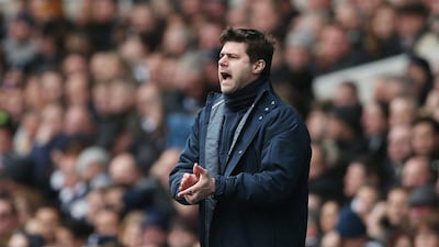 Tottenham Hotspur coach Mauricio Pochettino observes his side during their Premier League draw with West Ham United on Sunday. Matthew Childs / Reuters / February 22, 2015