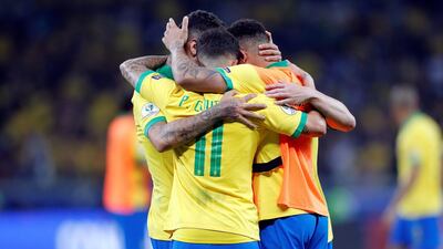 Brazil players celebrate. EPA