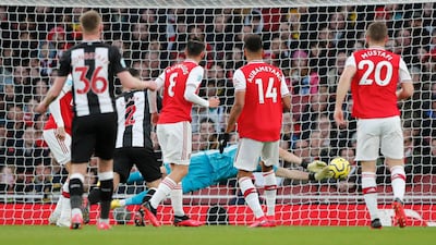 Arsenal goalkeeper Bernd Leno saves a deflected shot from Newcastle's Sean Longstaf. AP