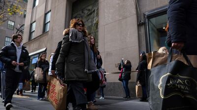 Shoppers in Fifth Avenue in New York. AP
