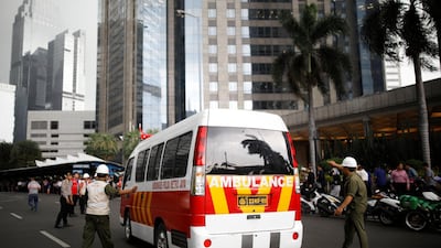 An ambulance arrives at the Indonesian Stock Exchange building following reports of a collapsed structure inside the building in Jakarta, Indonesia on January 15, 2018. Darren Whiteside / Reuters