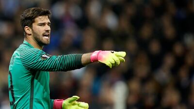 Alisson Becker could become the world's most expensive goalkeeper if he completes his move to Liverpool. Guillaume Horcajuelo / EPA