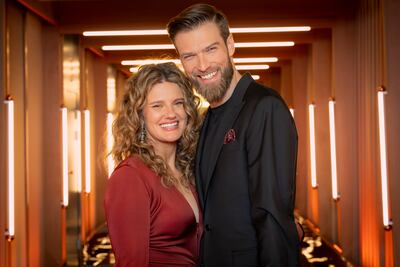 Actress Zofia Zborowska-Wrona, left, and her husband and volley ball star Andrzej Wrona host Love is Blind: Poland. Photo: Netflix
