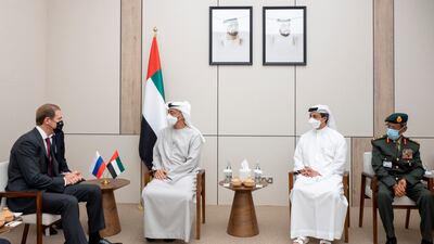 Sheikh Mohamed meets Denis Manturov, Russia's Minister of Industry and Trade, left, at the airshow, with Lt Gen Hamad Thani Al Romaithi, Chief of Staff of UAE Armed Forces, right, and Sheikh Mansour bin Zayed, Deputy Prime Minister and Minister of Presidential Affairs, second right.