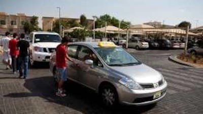 Taxi drivers in Al Ain are in a dispute with TransAD over fines.