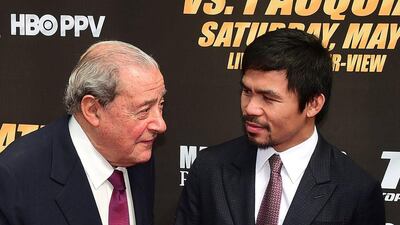 Manny Pacquiao shown with Bob Arum in the run-up to his March fight against Floyd Mayweather, which he lost. Frederic J Brown / AFP / March 11, 2015