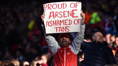 One Arsenal fan shows his support for Arsene Wenger. Ben Stansall / AFP