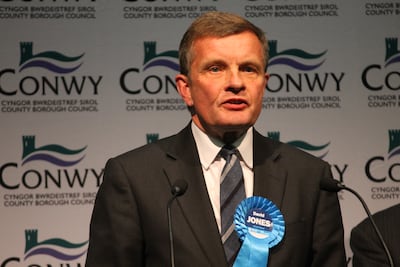 David Jones has been the Conservative Member of Parliament for Clwyd West since 2005. He has a long-standing interest in Middle Eastern Affairs and is chairman of the Council for Arab -British Understanding (CAABU) and also chairs the All-Party Parliamentary Groups for Jordan, Libya and the United Arab Emirates, in which capacities he has made several visits to the region. Wikimedia Commons