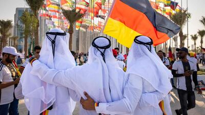 Football fans supporting Germany cheer in Doha, ahead of the Qatar 2022 FIFA World Cup football tournament. AFP