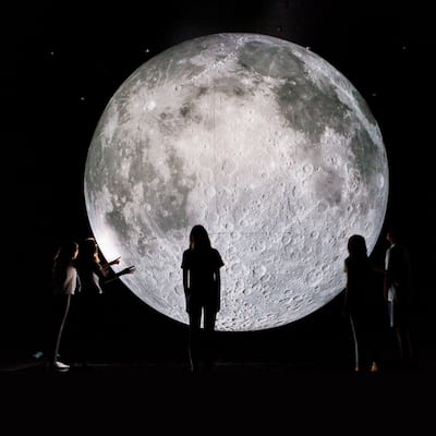 A replica of the Moon has landed at OliOli. It will be on display until April 30. Photo: OliOli