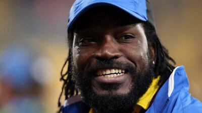 West Indies Chris Gayle smiles after the Quarter Final Cricket World Cup match between New Zealand and the West Indies played at the Wellington Regional Stadium in Wellington. The storm surrounding star cricketer Chris Gayle over an attempt to flirt with an Australian presenter on live TV intensified on January 6, 2016 as new allegations about his behaviour towards women emerged. Michael Bradley / AFP