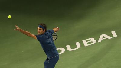 Federer unleashes a serve. AFP