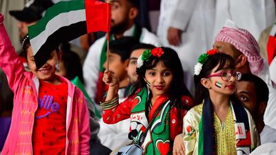 Young Emirati fans cheer during the 2019 AFC Asian Cup quarter-final football match between UAE and Australia. AFP