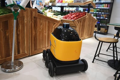 A Zhen Robotics delivery robot in a Suning supermarket. AFP