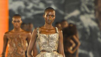 Balmain's gold armour-style dress. Getty Images