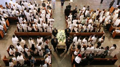 The coffin of Rayshard Brooks, who was shot dead on June 12 by an Atlanta police officer, is carried for his funeral at Ebenezer Baptist Church in Atlanta, Georgia. Reuters