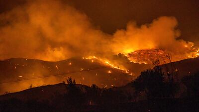 Trees burn on the slopes of the Troodos mountain range.