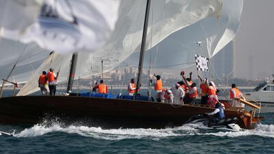 Emirati team celebrate their winning of the 29th annual dhow sailing race, known as Al Gaffal, at the finish line in Dubai. AFP