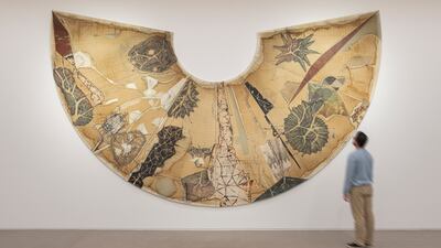 Jitish Kallat's stunning large-scale work 'Postulates from a Restless Radius' features a canvas that unfolds as a flattened globe. Photo: Ismail Noor
