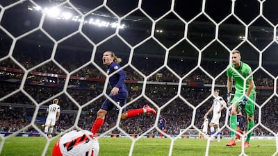 France's Antoine Griezmann celebrates scoring their first goal against Finland in Uefa World Cup qualifying Group D at the Groupama Stadium, Lyon. AFP