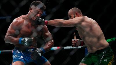 Azamat Murzakanov lands a punch on Alonzo Menifield at UFC Fight Night in Abu Dhabi.