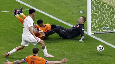 Netherlands go 2-1 up thanks to Mert Muldur's own goal. EPA