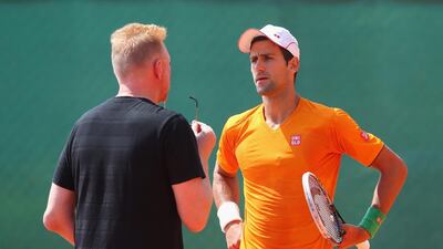 Novak Djokovic talks over strategy with new coach Boris Becker in a practice session for the ATP Monte Carlo Rolex Masters on April 14, 2014 in Monaco. Julian Finney / Getty Images
