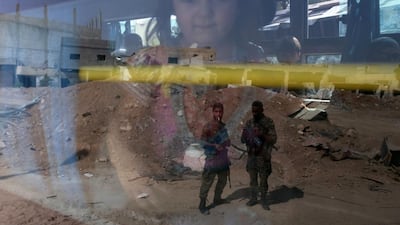 Syrian government troops are seen reflected on the window of a bus carrying people as part of an evacuation from the town of Daraya outside the capital Damascus, under a deal agreed between the government and opposition fighters after a four-year army siege. Youssef Karwashan / AFP