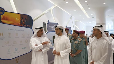 ABU DHABI, UNITED ARAB EMIRATES - September 20, 2017: HH Lt General Sheikh Saif bin Zayed Al Nahyan, UAE Deputy Prime Minister and Minister of Interior (L), HH Sheikh Mansour bin Zayed Al Nahyan, UAE Deputy Prime Minister and Minister of Presidential Affairs (2nd L) and HE Dr Ahmed Abdullah Humaid Belhoul Al Falasi, UAE Minister of State for Higher Education (R), tour the Rabdan Academy during the inauguration. ( Mohamed Al Hammadi / Crown Prince Court - Abu Dhabi ) ---