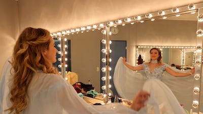 Singer Christy Altomare prepares in her room backstage before the premiere.