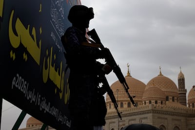 A Houthi soldier stands guard during a protest against US and Israeli military strikes on Iran, in Sanaa. EPA