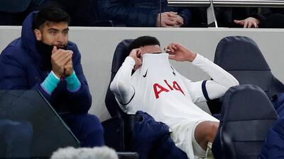 Midfielder Dele Alli reacts after having been substituted against RB Leipzig. AFP