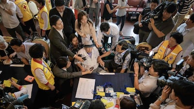 Participant Ahn Jong-ho speaks to reporters as he arrives at a hotel and gathering point ahead of the inter-Korean family reunion in Sokcho. AFP